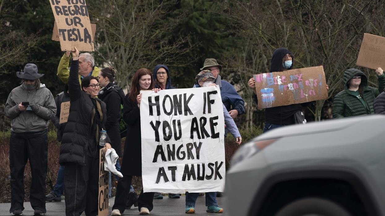 Demonstrators gather for a protest against Elon Musk
