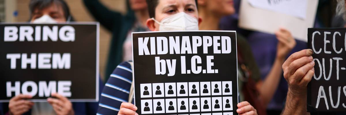 Demonstrators gather to protest against the deportation of immigrants to El Salvador