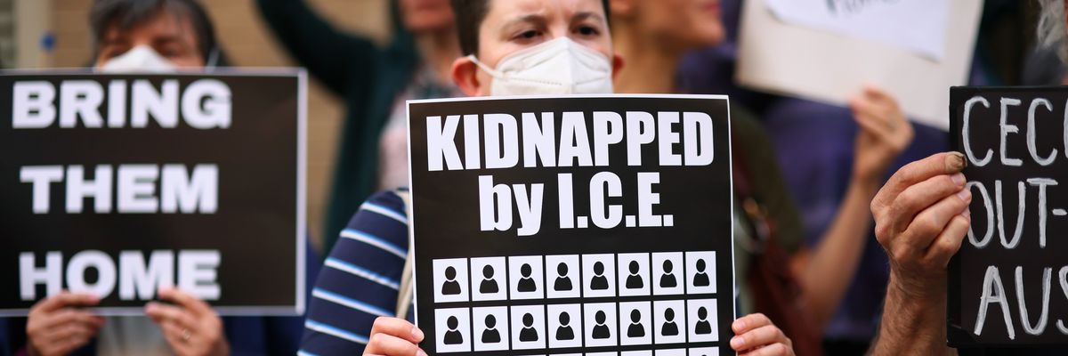 Demonstrators gather to protest against the deportation of immigrants to El Salvador