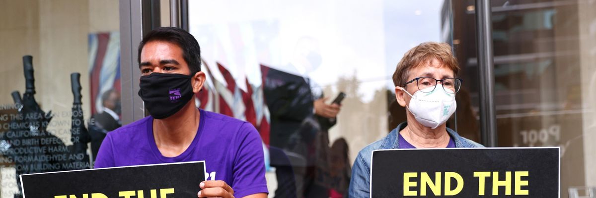 Demonstrators hold a sit-in calling for an end to the filibuster