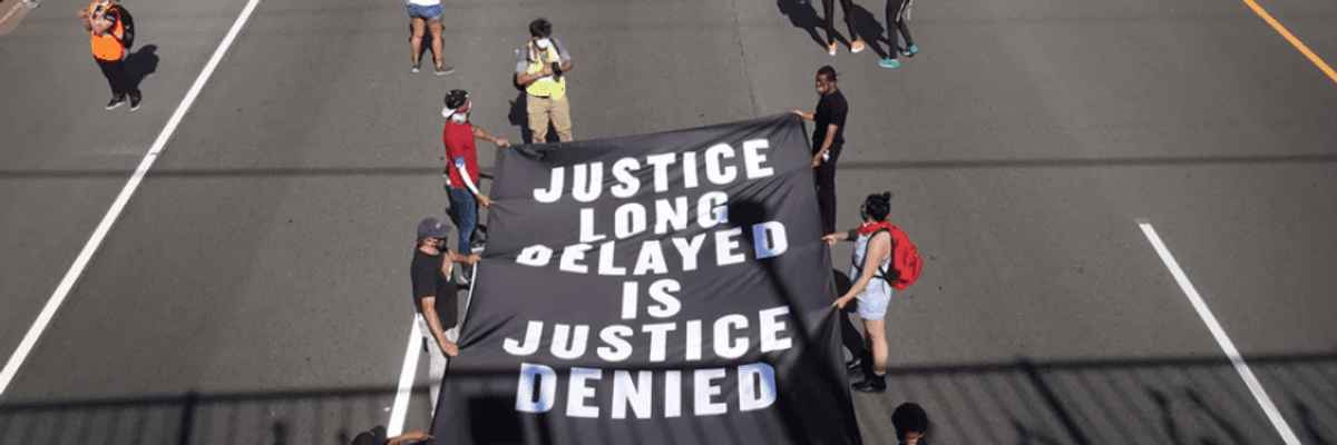 Demonstrators march down I-94 in St. Paul, Minnesota on May 31 during a protest over the death in police custody of George Floyd.