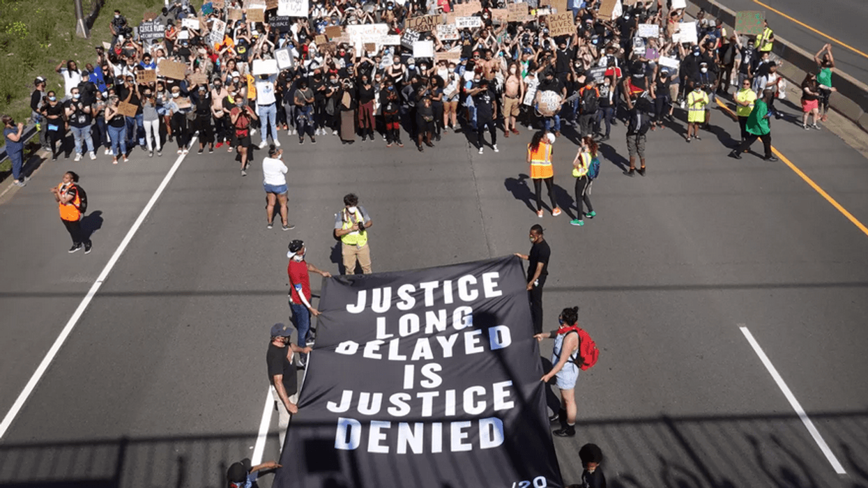 Demonstrators march down I-94 in St. Paul, Minnesota