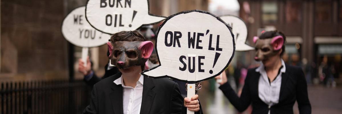 Demonstrators march in Glasgow during the COP26 summit.