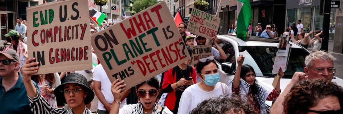 Demonstrators march through Boston,