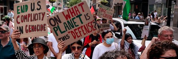 Demonstrators march through Boston,