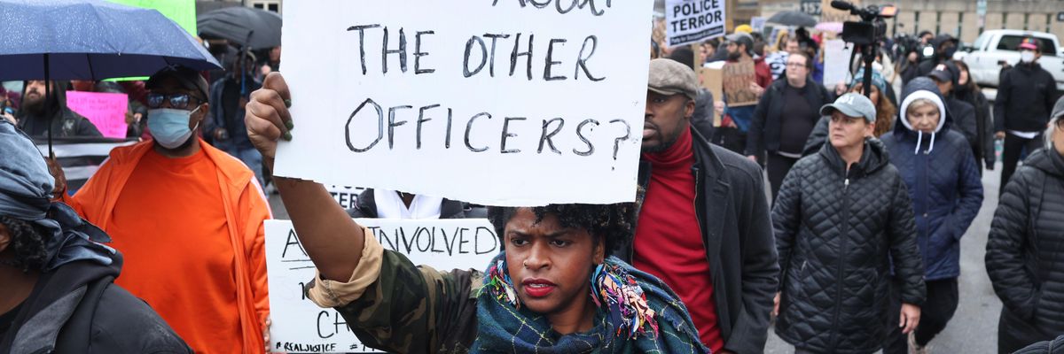 Demonstrators march through downtown protesting the death of Tyre Nichols on January 28, 2023 in Memphis, Tennessee.