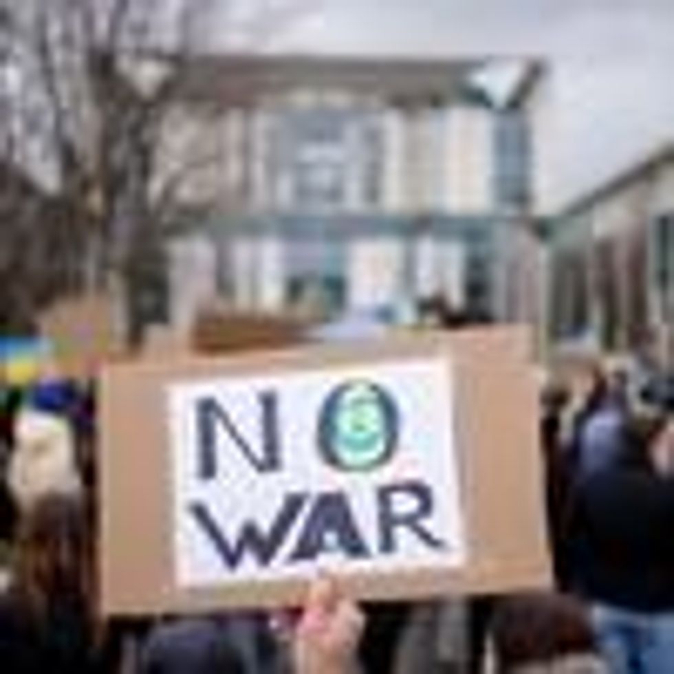 Demonstrators protest against the war and the Russian invasion of Ukraine in front of the Federal Chancellery on February 25, 2022 in Berlin