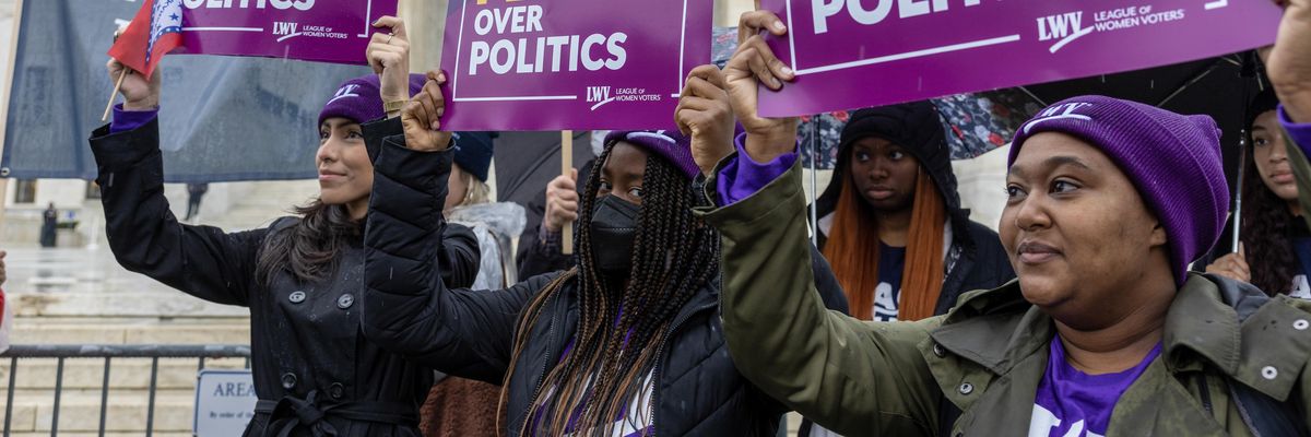 Demonstrators protest during a "No Lawless Lawmakers" rally at the U.S. Supreme Court during oral arguments in Moore v. Harper on December 7, 2022 in Washington, D.C.