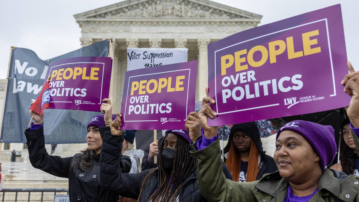 Demonstrators protest during a "No Lawless Lawmakers" rally at the U.S. Supreme Court during oral arguments in Moore v. Harper on December 7, 2022 in Washington, D.C.