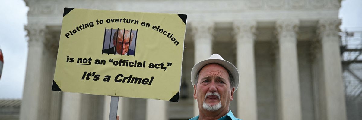 Demonstrators protest in front of the U.S. Supreme Court