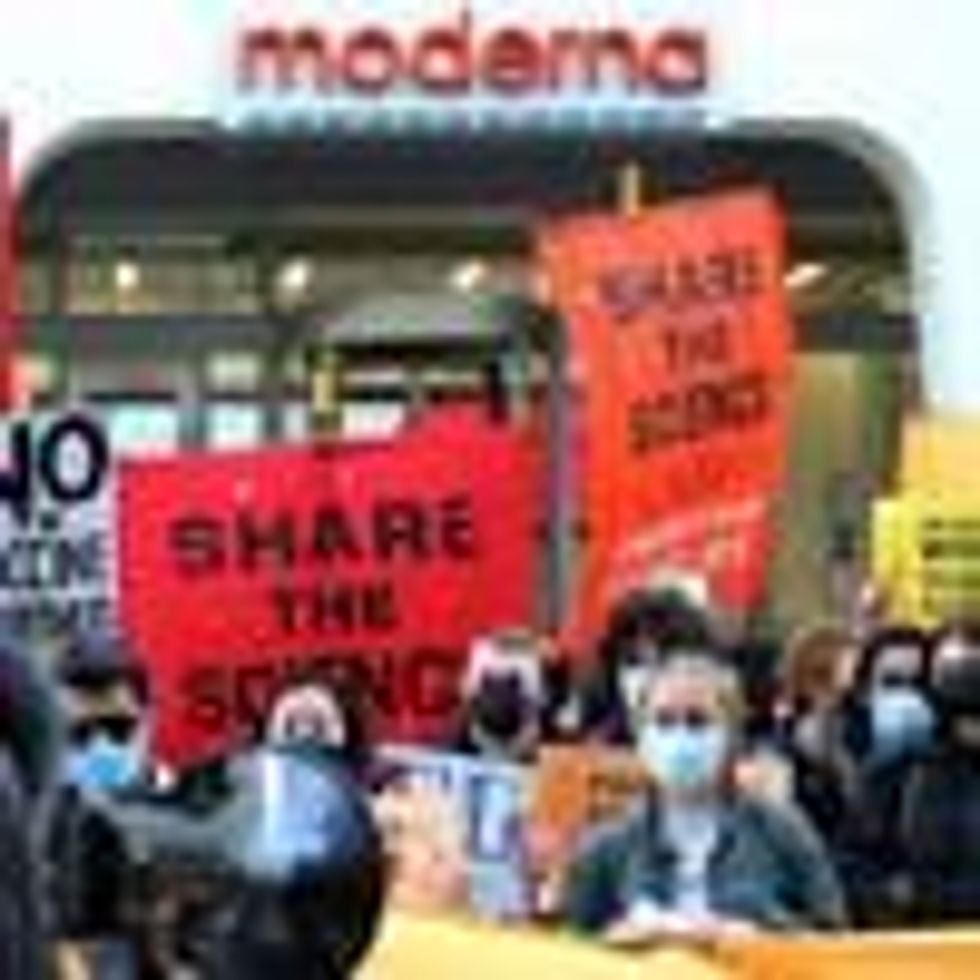Demonstrators protest outside Moderna headquarters
