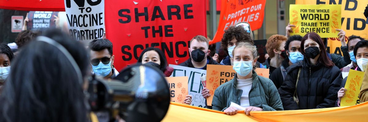 Demonstrators protest outside Moderna headquarters