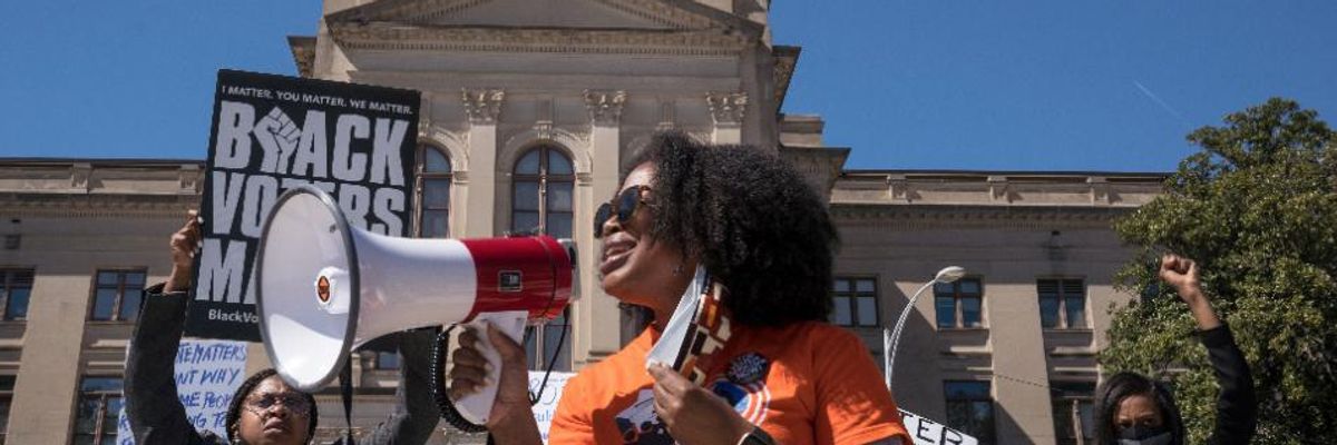 Georgia Hit With Pair of Lawsuits Over Sweeping Voter Suppression Law