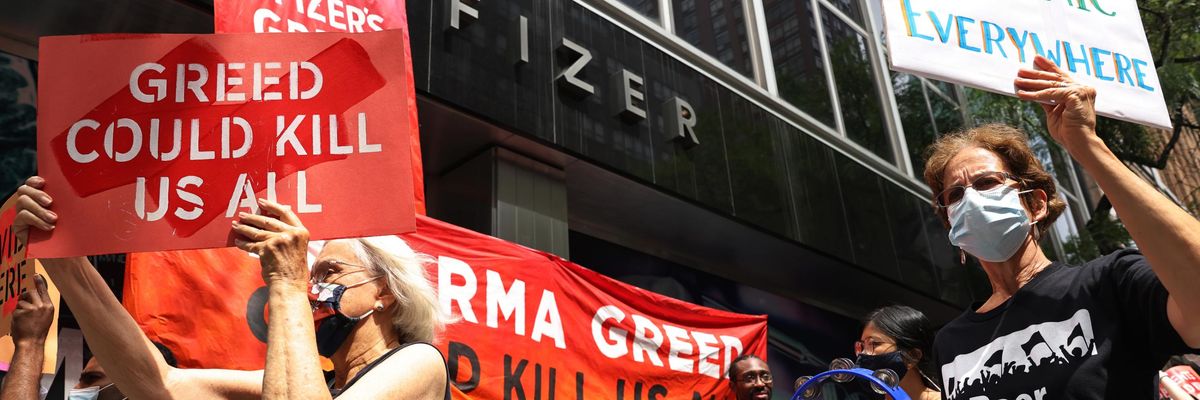 Demonstrators protest outside Pfizer's headquarters in Manhattan.