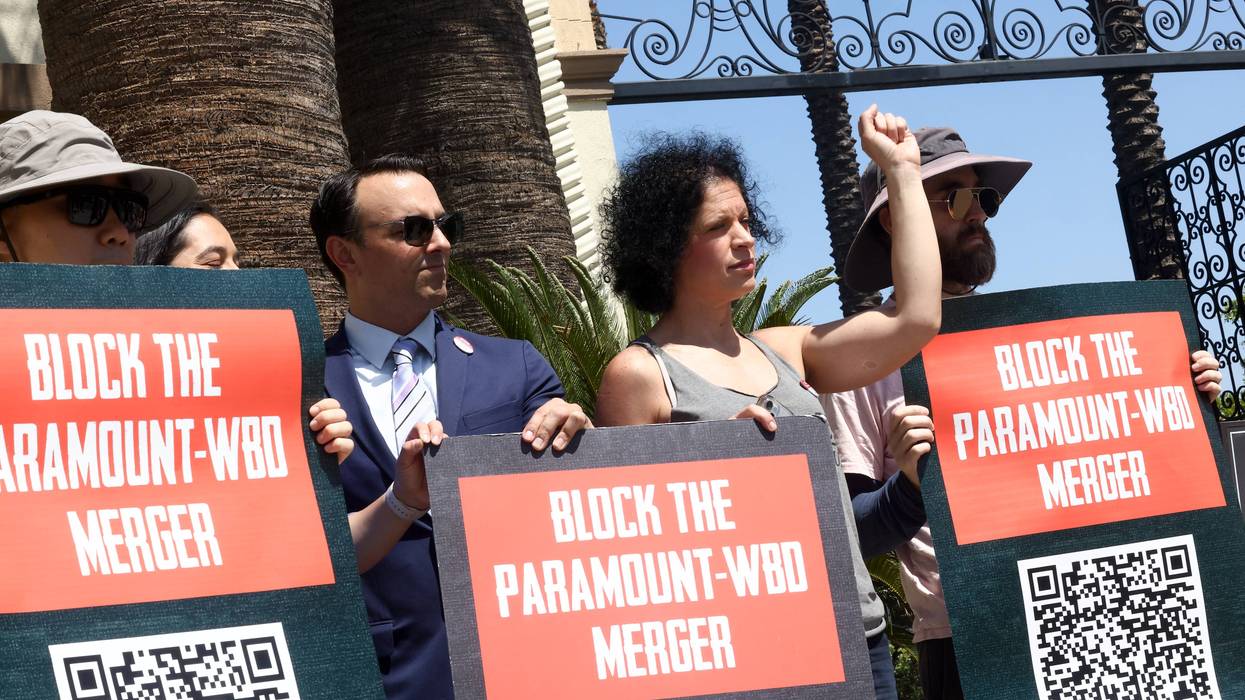 Demonstrators protest the proposed merger of Paramount and Warner Bros. Discovery