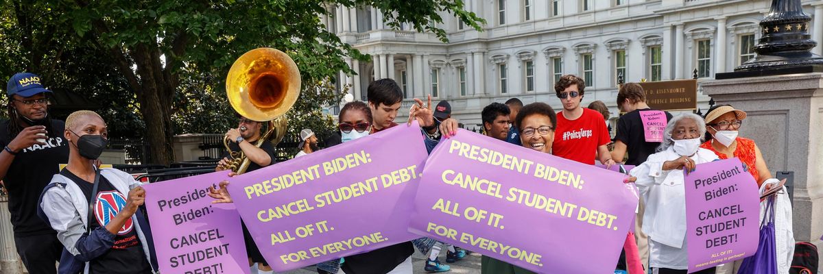 Demonstrators push President Joe Biden to cancel all outstanding student debt