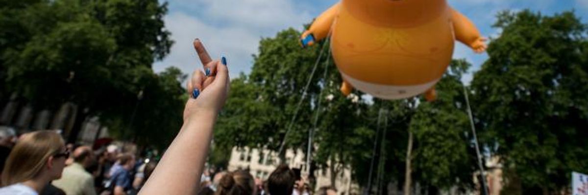 Angry Trump Baby Takes Flight as UK Protests Tell President He's Not Welcome