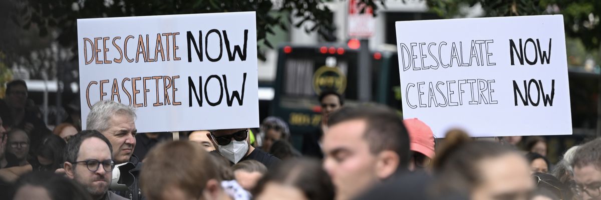 Demonstrators rally in support of a cease-fire