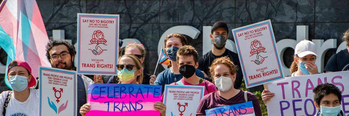Demonstrators supporting trans children and gender affirmation treatments rally outside of Boston Children's Hospital in Boston, Massachusetts, on September 18, 2022.
