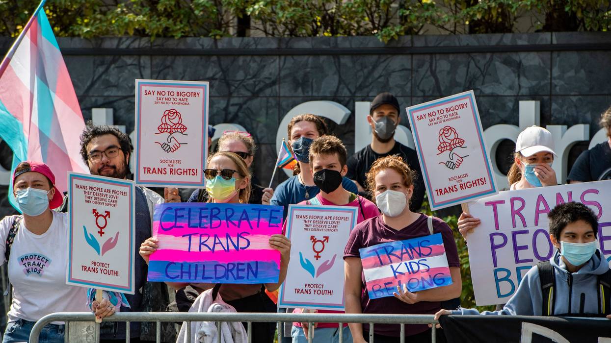 Demonstrators supporting trans children and gender affirmation treatments rally outside of Boston Children's Hospital in Boston, Massachusetts, on September 18, 2022.