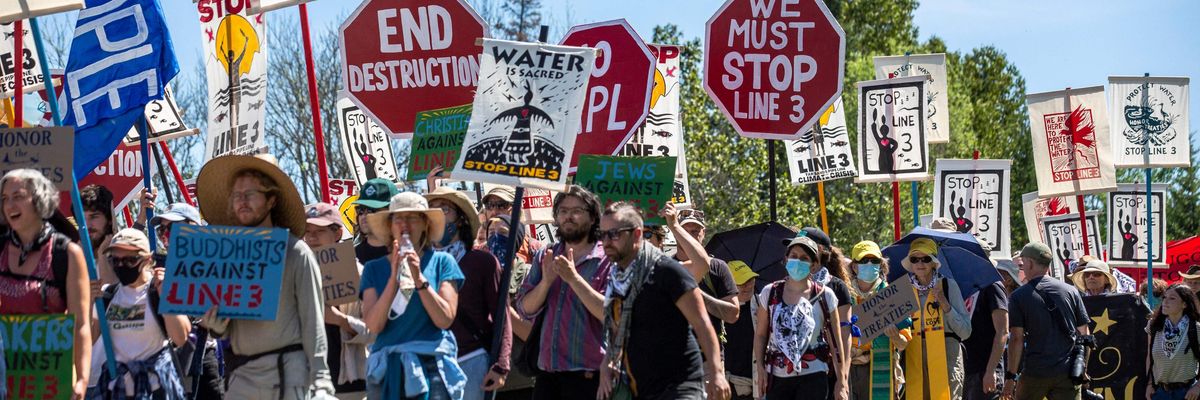 Demonstrators take part in a march against Line 3