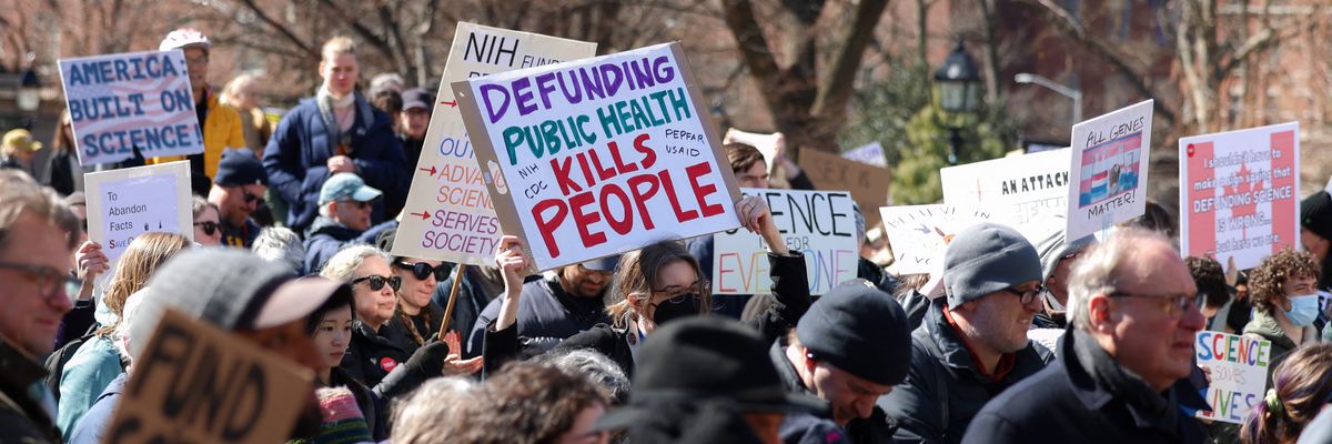 Demonstrators take part in a "Stand Up For Science" rally