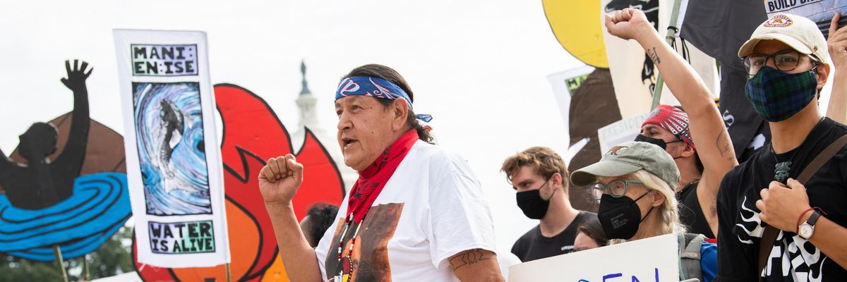 Demonstrators urge President Joe Biden to cancel the Mountain Valley Pipeline