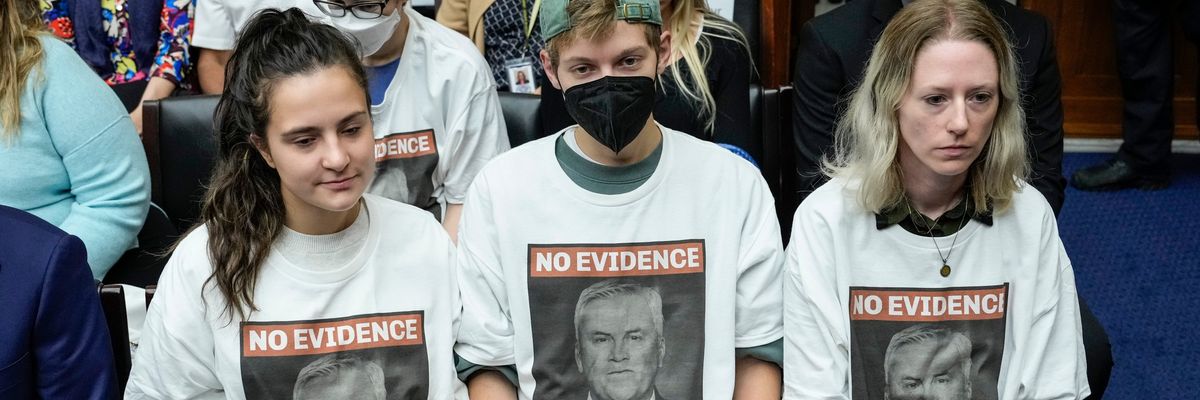 Demonstrators wear shirts declaring House Oversight chair James Comer has "No Evidence" for a Biden impeachment.