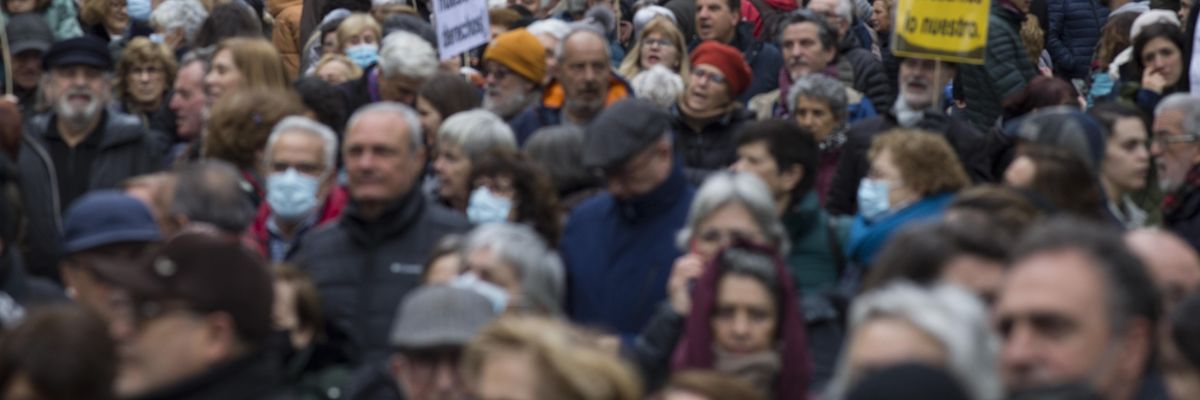 Demonstrators with banners and placards agasint privatization of healthcare in Spain