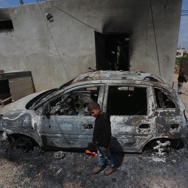 Destroyed car in West Bank