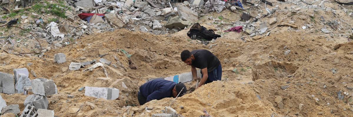Destruction is seen in a cemetery resulting from Israeli army attacks