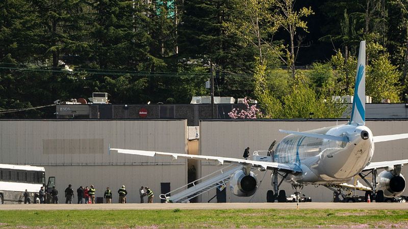 Detainees Are Loaded Onto ICE Flights At Seattle's King County International Airport
