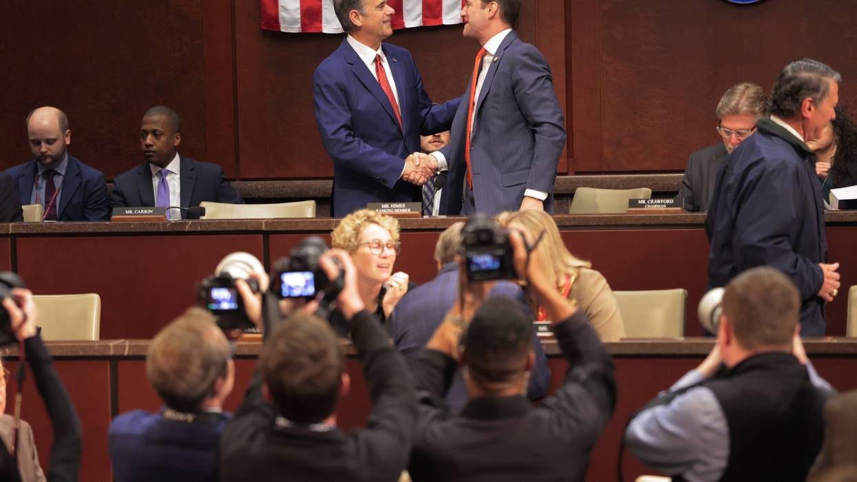 Director of the Central Intelligence Agency John Ratcliffe shakes hands with House Permanent Select Committee on Intelligence Ranking Member Jim Himes
