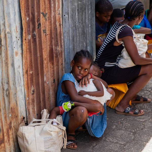Displaced Haitians are seen in a shelter camp