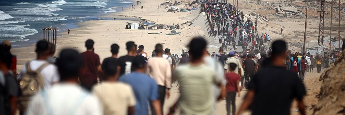 Displaced Palestinians Return North as Israel and Hamas Agree to War Pause