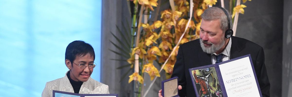 Dmitrij Muratov and Maria Ressa attend the Nobel Peace Prize ceremony 2021 at Oslo City Town Hall on December 10, 2021 in Oslo, Norway.