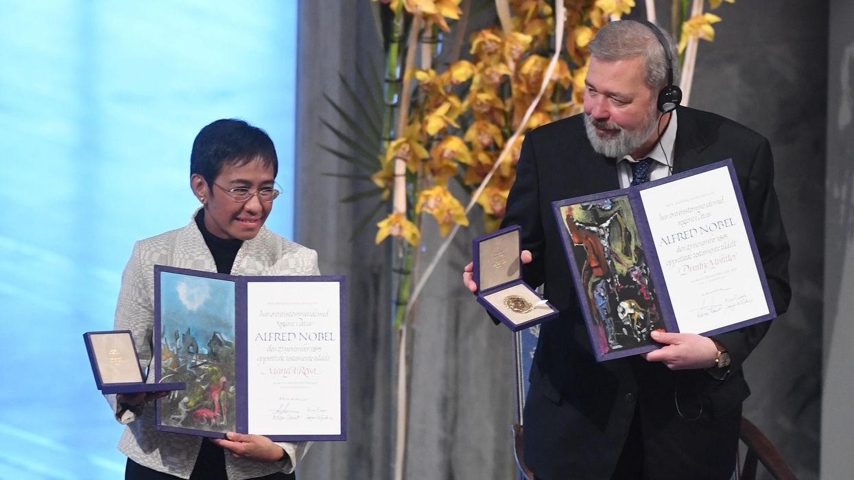 Dmitrij Muratov and Maria Ressa attend the Nobel Peace Prize ceremony 2021 at Oslo City Town Hall on December 10, 2021 in Oslo, Norway.