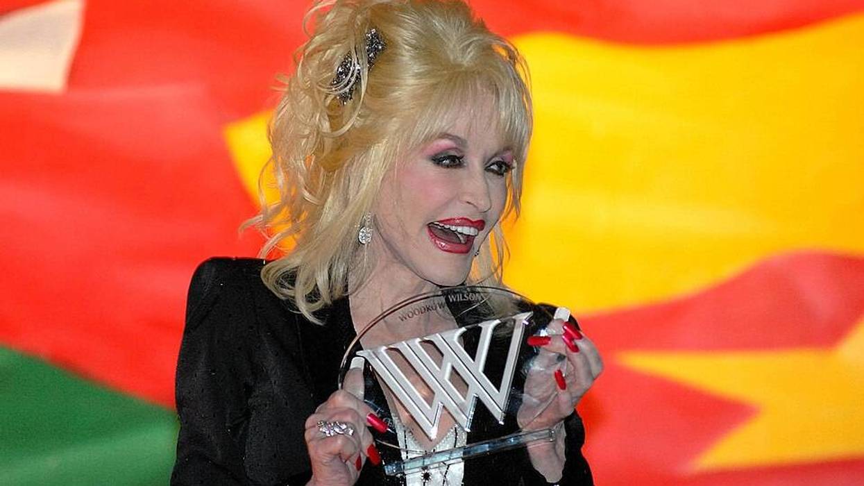 Dolly Parton accepts award.