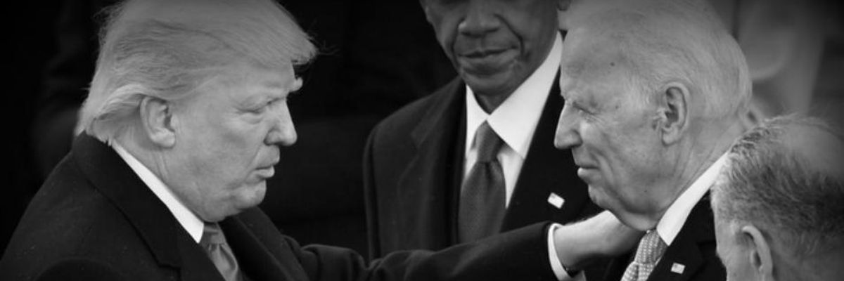 Donald J. Trump shakes hands with  Joe Biden