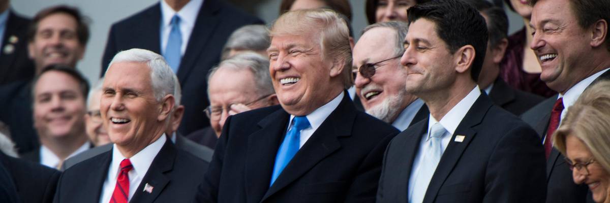 Donald Trump and Republican lawmakers celebrate passage of their tax-cut bill