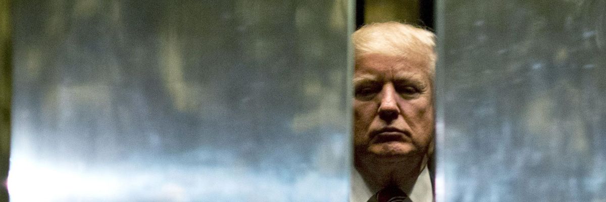 Donald Trump heads back into the elevator at Trump Tower on January 16, 2017 in New York City.