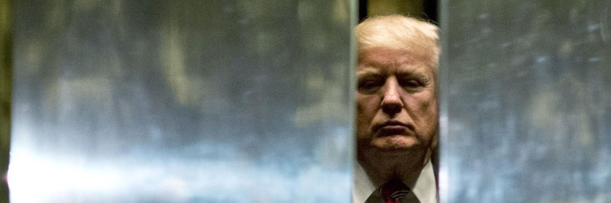Donald Trump heads back into the elevator at Trump Tower on January 16, 2017 in New York City.