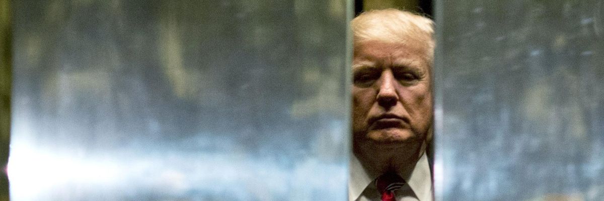 Donald Trump heads back into the elevator at Trump Tower on January 16, 2017, in New York City.