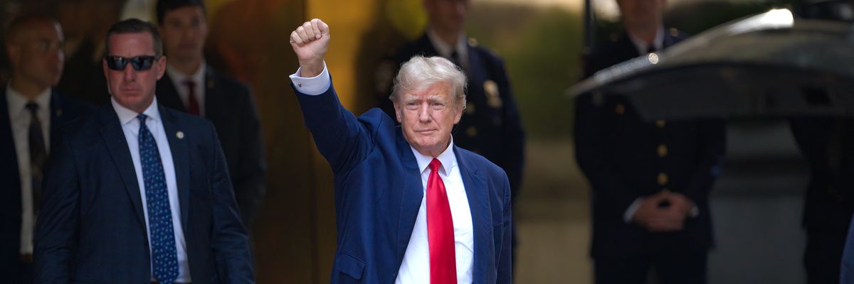 Donald Trump leaves Trump Tower