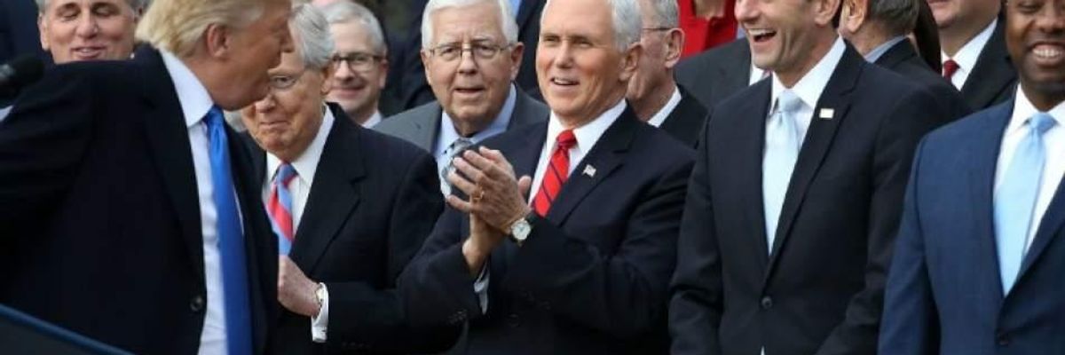 Donald Trump, Paul Ryan, Mike Pence, Mitch McConnell celebrating tax cut passage in 2017