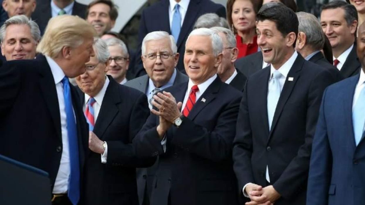Donald Trump, Paul Ryan, Mike Pence, Mitch McConnell celebrating tax cut passage in 2017