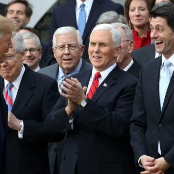 Donald Trump, Paul Ryan, Mike Pence, Mitch McConnell celebrating tax cut passage in 2017