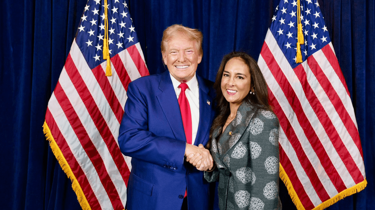 Donald Trump shakes hands with Harmeet Dhillon