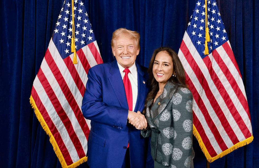 Donald Trump shakes hands with Harmeet Dhillon