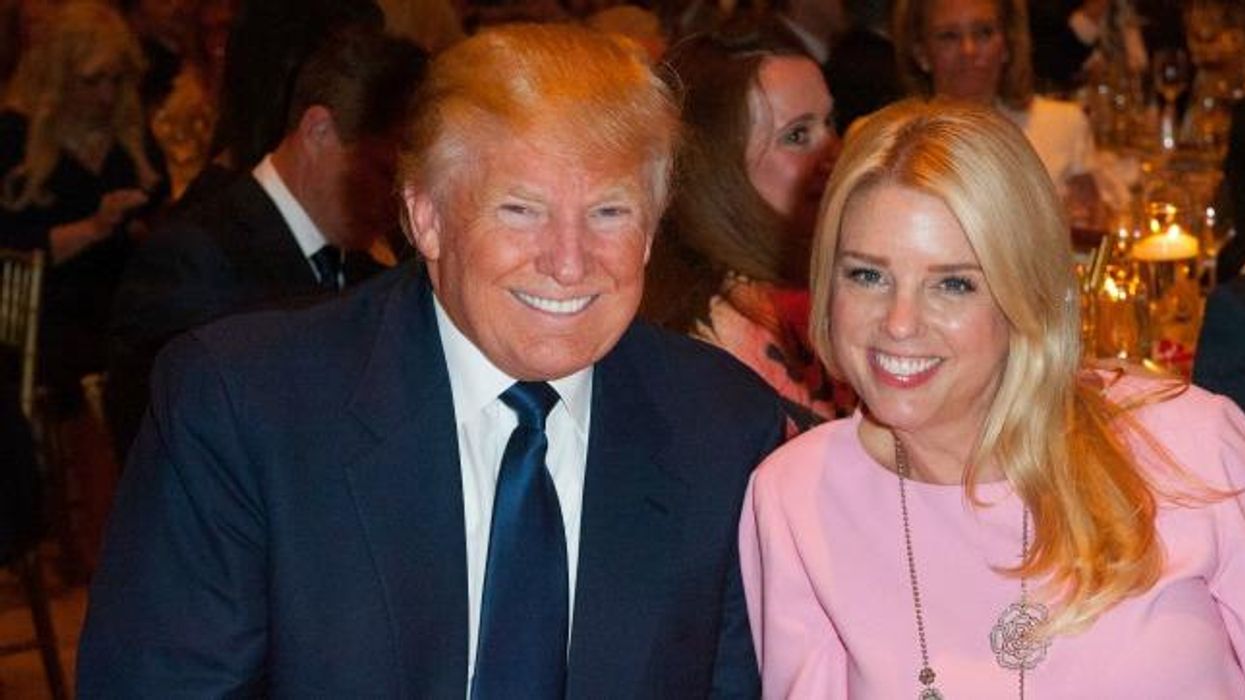 Donald Trump sits next to Pam Bondi